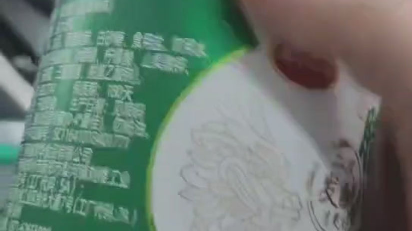 Fully Automatic High-Precision Labeling System for Round Bottles